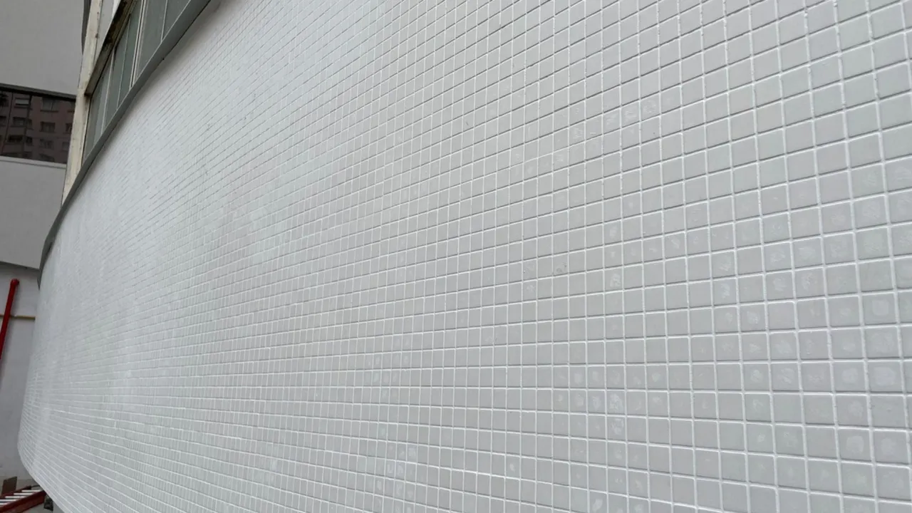 Close-up of the renovated tiled façade