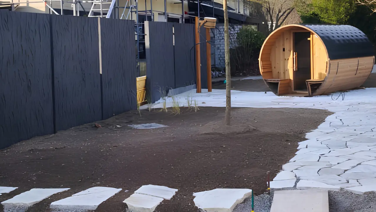 Aesthetic partition walls serve as privacy screens for the barrel saunas.