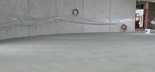 Emcefix floor can also be used to repair large areas of screed and concrete flooring. The screed in the photo was full of blowholes. They were closed with a large-area Emcefix floor scratch and blowhole filler compound, giving the floor a durable and aesthetically appealing repaired finish.  <br>&copy; MC-Bauchemie 2026