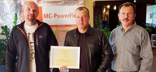 The MC team of Martin Struk, Michal Lehký and Milan Řičica (from left to right) proudly show off the certificate for first place in the SAVT competition for the strongest UHPC concrete.  <br>&copy; MC-Bauchemie 2026