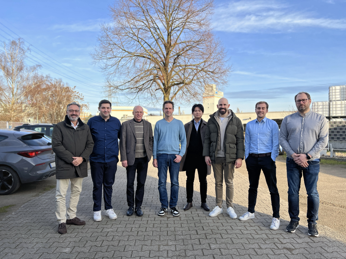 Photo of the core team of the MCU business unit in front of MC’s headquarters in Bottrop.